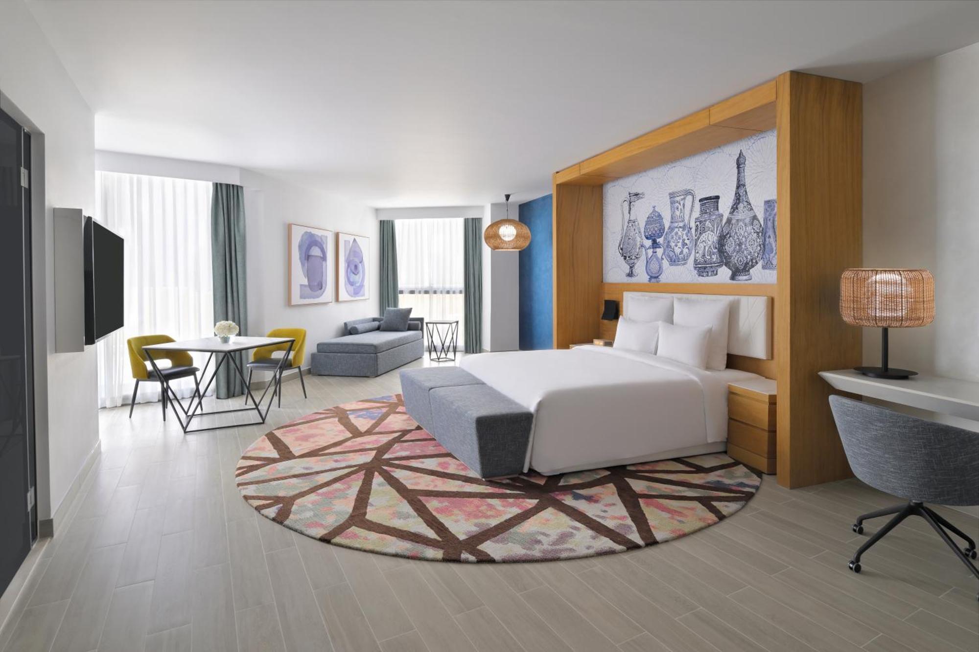 Moevenpick Hotel & Apartments Ghala Mascate Extérieur photo A typical room at the hotel